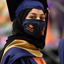 masked graduating student